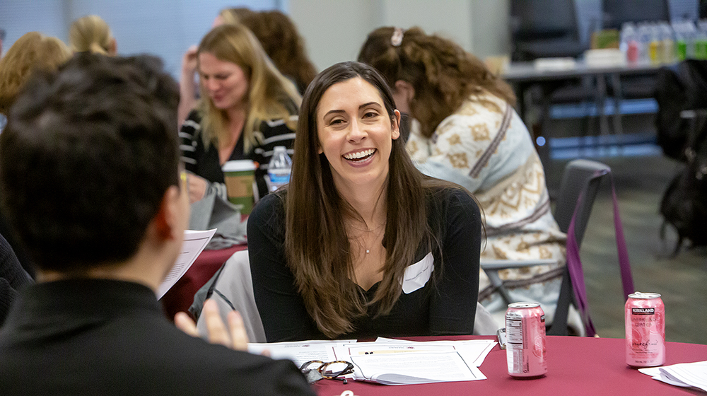 A woman laughs at the April 2024 preceptor workshop